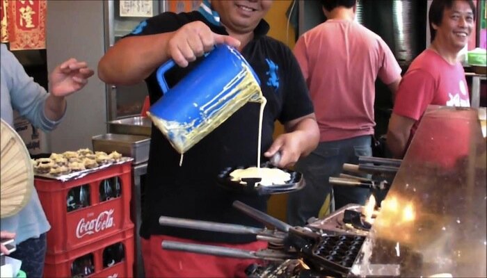 Hong Kong Street Food. Egg Waffles (Gei Dan Jai) in Cheung Chau (an Hong Kong outlying island)